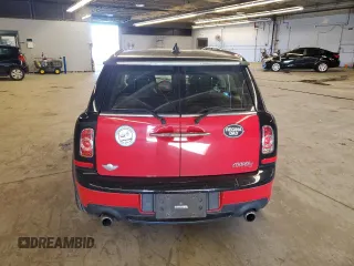 2014 MINI Clubman S z VIN WMWZG3C52ET800765, wystawiony jako Copart lot #76470874 z przebiegiem 103 971 mil mil oraz Szkoda całkowita • Salvage title. Historia ofert i sprzedaży dostępna na DreamBid. Obrazek 6.