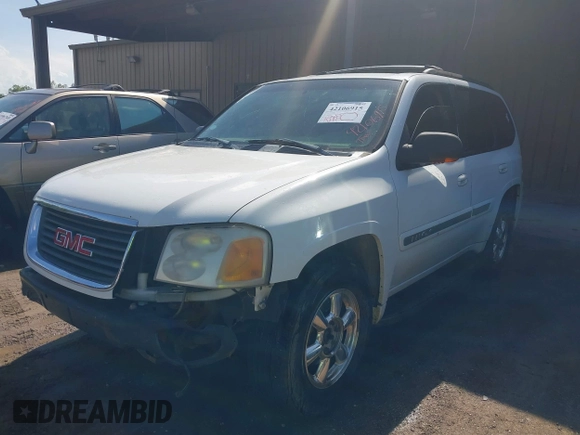 2003 GMC Envoy SLT with VIN 1GKDT13S432190085, listed as a IAAI auction lot 42106915 with 289,933 mi miles. Bid and sale history available at carsss.com. Image 2.