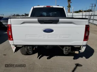 2022 Ford F-150 XL with VIN 1FTEW1EB9NKE67725, listed as a Copart auction lot 82253604 with 14,760 mi miles and Salvage Title. Bid and sale history available at carsss.com. Image 6.