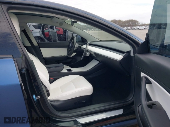 2018 Tesla Model 3 Long Range Battery with VIN 5YJ3E1EB9JF134958, listed as a IAAI auction lot 41980958 with 80,367 mi miles and . Bid and sale history available at DreamBid. Image 5.