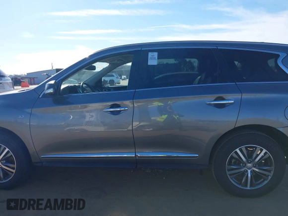 2020 Infiniti QX60 Luxe with VIN 5N1DL0MN5LC520126, listed as a IAAI auction lot 41698233 with 75,249 mi miles and . Bid and sale history available at DreamBid. Image 14.