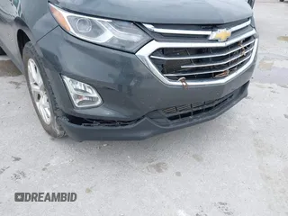 2021 Chevrolet Equinox Premier z VIN 2GNAXNEV9M6140537, wystawiony jako IAAI lot #42016514 z przebiegiem 52 237 mil mil oraz . Historia ofert i sprzedaży dostępna na DreamBid. Obrazek 6.