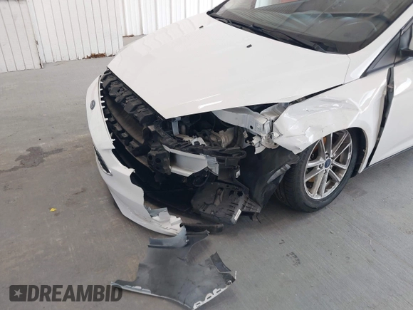 2017 Ford Focus SE with VIN 1FADP3F2XHL342823, listed as a IAAI auction lot 42496940 with 97,263 mi miles and . Bid and sale history available at DreamBid. Image 6.