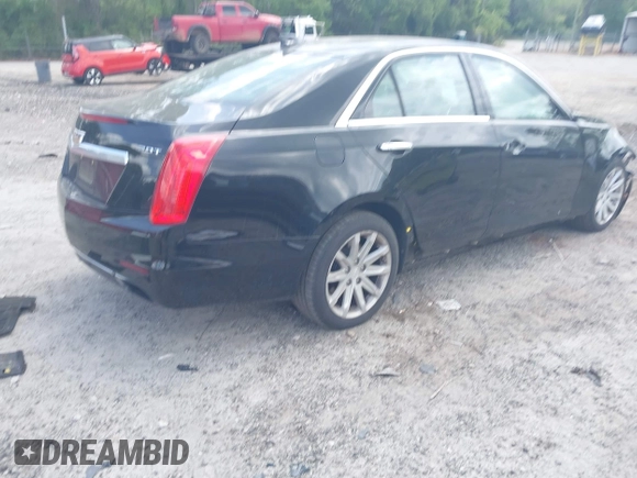 2016 Cadillac CTS RWD with VIN 1G6AP5SX0G0118831, listed as a IAAI auction lot 42105091 with 123,507 mi miles and . Bid and sale history available at DreamBid. Image 4.