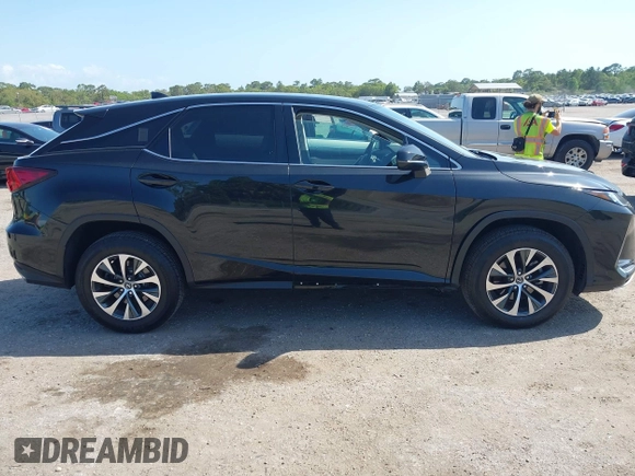 2021 Lexus RX with VIN 2T2AZMAA2MC196524, listed as a IAAI auction lot 42017362 with 80,922 mi miles. Bid and sale history available at carsss.com. Image 13.