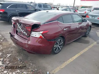 2016 Nissan Maxima SV with VIN 1N4AA6AP9GC410441, listed as a IAAI auction lot 41479069 with 74,252 mi miles and . Bid and sale history available at DreamBid. Image 4.