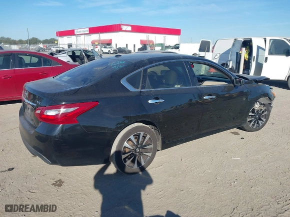2018 Nissan Altima 2.5 SV with VIN 1N4AL3AP9JC110947, listed as a IAAI auction lot 40555479 with 191,294 mi miles. Bid and sale history available at carsss.com. Image 4.