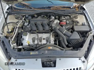 2009 Mercury Milan Premier with VIN 3MEHM081X9R628373, listed as a Copart auction lot 56166035 with 100,892 mi miles and Salvage title. Bid and sale history available at DreamBid. Image 11.