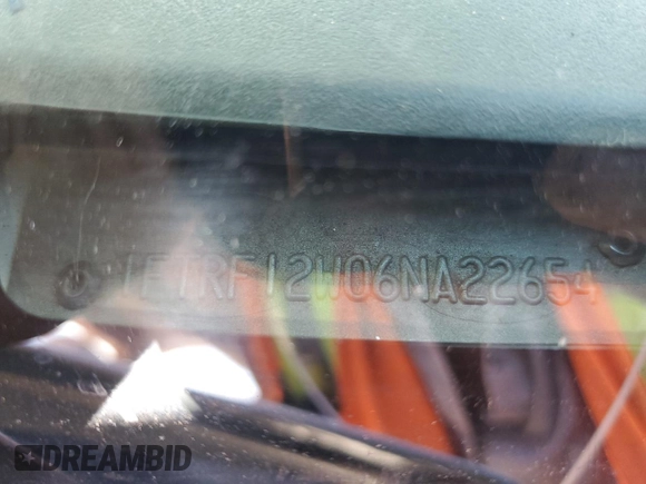 2006 Ford F-150 XL with VIN 1FTRF12W06NA22654, listed as a Copart auction lot 57064735 with 228,697 mi miles and Salvage title. Bid and sale history available at DreamBid. Image 12.