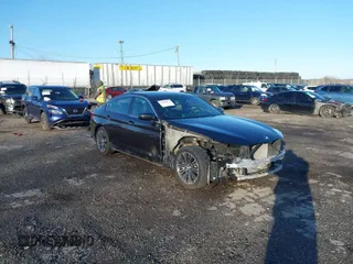 2018 BMW 5 Series 530i xDrive with VIN WBAJA7C59JWA71617, listed as a IAAI auction lot 41849019 with 94,654 mi miles. Bid and sale history available at carsss.com. Image 1.