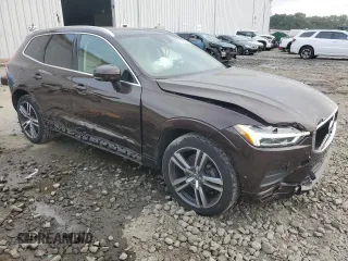 2018 Volvo XC60 Momentum with VIN LYV102RK5JB116738, listed as a Copart auction lot 71602444 with 53,916 mi miles and Salvage title. Bid and sale history available at DreamBid. Image 4.