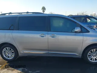 2012 Toyota Sienna XLE AAS with VIN 5TDYK3DC0CS243912, listed as a IAAI auction lot 41758833 with 132,008 mi miles and . Bid and sale history available at DreamBid. Image 13.