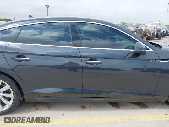 2018 Audi A5 Sportback Premium z VIN WAUANCF5XJA022221, wystawiony jako IAAI lot #42041410 z przebiegiem 94 851 mil mil oraz . Historia ofert i sprzedaży dostępna na DreamBid. Obrazek 13.