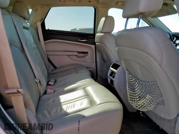 2016 Cadillac SRX Performance Collection with VIN 3GYFNCE37GS573748, listed as a Copart auction lot 57506005 with 136,605 mi miles and Salvage title. Bid and sale history available at DreamBid. Image 11.
