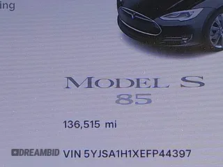 2014 Tesla Model S 60 z VIN 5YJSA1H1XEFP44397, wystawiony jako IAAI lot #42140917 z przebiegiem 136 515 mil mil oraz . Historia ofert i sprzedaży dostępna na DreamBid. Obrazek 16.