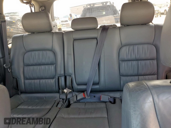2001 Lexus LX 470 z VIN JTJHT00W313504330, wystawiony jako Copart lot #61126435 z przebiegiem 87 049 mil mil oraz Czysty tytuł • Clean title. Historia ofert i sprzedaży dostępna na DreamBid. Obrazek 10.