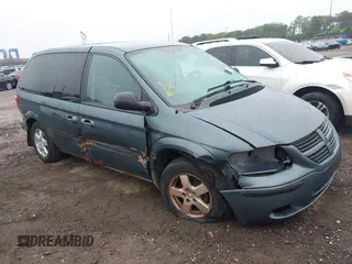 2005 Dodge Caravan SXT with VIN 1D4GP45R55B279825, listed as a IAAI auction lot 42532684 with 157,167 mi miles and . Bid and sale history available at DreamBid. Image 1.