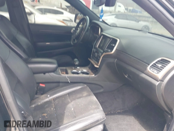 2015 Jeep Grand Cherokee Altitude z VIN 1C4RJFAG5FC682058, wystawiony jako IAAI lot #42352814 z przebiegiem 228 067 mil mil oraz . Historia ofert i sprzedaży dostępna na DreamBid. Obrazek 5.