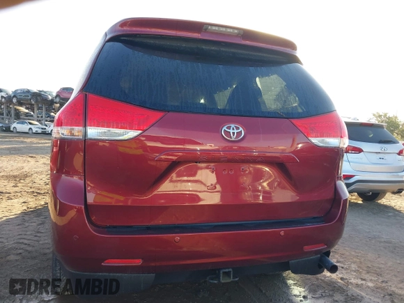 2014 Toyota Sienna XLE with VIN 5TDYK3DCXES473671, listed as a IAAI auction lot 42243030 with 70,052 mi miles and . Bid and sale history available at DreamBid. Image 16.