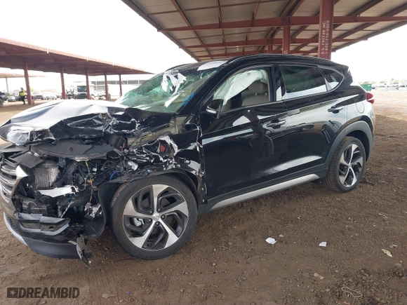 2017 Hyundai Tucson Value with VIN KM8J33A22HU316495, listed as a IAAI auction lot 41896507 with 82,517 mi miles. Bid and sale history available at carsss.com. Image 17.