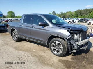 2017 Honda Ridgeline RTL-E with VIN 5FPYK3F70HB004377, listed as a Copart auction lot 52201415 with 170,729 mi miles and Salvage title. Bid and sale history available at DreamBid. Image 4.