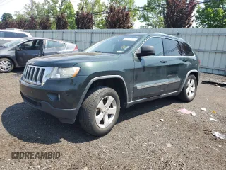 2011 Jeep Grand Cherokee Laredo with VIN 1J4RR4GG4BC673652, listed as a Copart auction lot 60517935 with 93,468 mi miles and Salvage title. Bid and sale history available at DreamBid. Image 1.