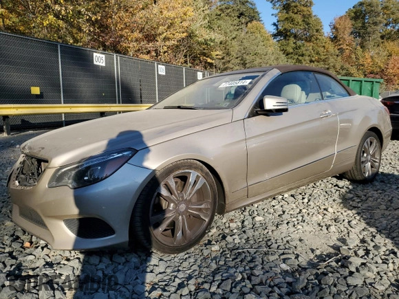 2016 Mercedes-Benz E 400 with VIN WDDKK6FF8GF334288, listed as a Copart auction lot 77405814 with 115,728 mi miles and Salvage Title. Bid and sale history available at carsss.com. Image 1.