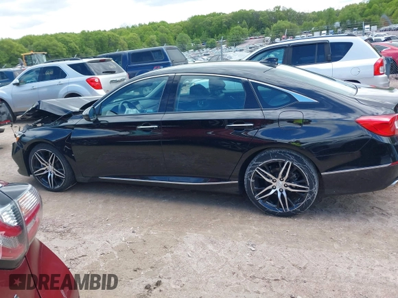 2021 Honda Accord Touring z VIN 1HGCV2F91MA022042, wystawiony jako IAAI lot #42301183 z przebiegiem 67 397 mil mil oraz . Historia ofert i sprzedaży dostępna na DreamBid. Obrazek 14.