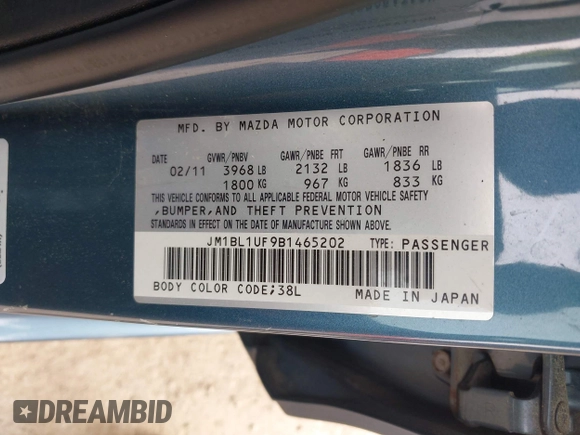 2011 Mazda Mazda3 i Sport with VIN JM1BL1UF9B1465202, listed as a IAAI auction lot 42119001 with 122,198 mi miles. Bid and sale history available at carsss.com. Image 9.