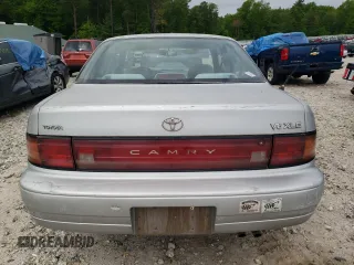 1993 Toyota Camry z VIN 4T1VK13EXPU097316, wystawiony jako Copart lot #58642935 z przebiegiem 81 760 mil mil oraz Czysty tytuł • Clean title. Historia ofert i sprzedaży dostępna na DreamBid. Obrazek 6.