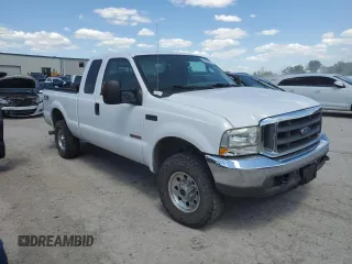 2004 Ford F-250 XL with VIN 1FTNX21P04EA92082, listed as a Copart auction lot 55311935 with 217,363 mi miles and Salvage title. Bid and sale history available at DreamBid. Image 4.
