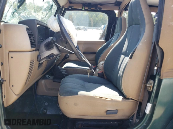 2001 Jeep Wrangler Sahara with VIN 1J4FA59S71P339334, listed as a Copart auction lot 74805224 with 265,778 mi miles and Salvage Title. Bid and sale history available at carsss.com. Image 7.
