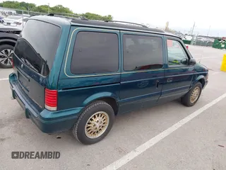 1994 Plymouth Voyager z VIN 2P4GH45R1RR703949, wystawiony jako IAAI lot #42330333 z przebiegiem 67 672 mil mil oraz . Historia ofert i sprzedaży dostępna na DreamBid. Obrazek 4.