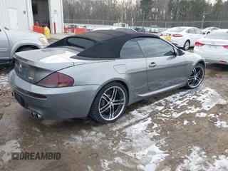 2008 BMW 6 Series M6 with VIN WBSEK93528CY79841, listed as a IAAI auction lot 41387298 with 108,103 mi miles. Bid and sale history available at carsss.com. Image 4.