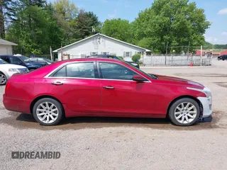 2014 Cadillac CTS AWD z VIN 1G6AW5SX3E0129127, wystawiony jako IAAI lot #42193399 z przebiegiem 108 037 mil mil oraz . Historia ofert i sprzedaży dostępna na DreamBid. Obrazek 14.