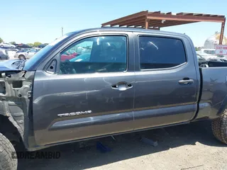 2023 Toyota Tacoma SR5 z VIN 3TMDZ5BN6PM153633, wystawiony jako IAAI lot #42353187 z przebiegiem 50 020 mil mil oraz . Historia ofert i sprzedaży dostępna na DreamBid. Obrazek 15.