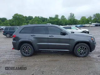 2017 Jeep Grand Cherokee Trailhawk with VIN 1C4RJFLG2HC645209, listed as a IAAI auction lot 42348470 with 170,905 mi miles and . Bid and sale history available at DreamBid. Image 13.