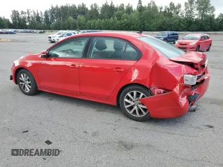 2012 Volkswagen Jetta SE with VIN 3VWDP7AJ8CM451446, listed as a Copart auction lot 61433295 with 134,196 mi miles and Salvage title. Bid and sale history available at DreamBid. Image 2.