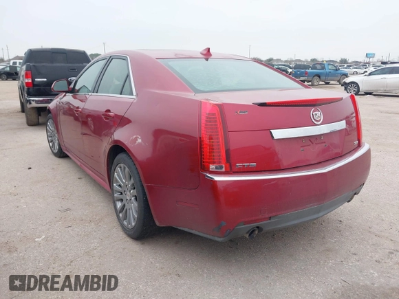 2012 Cadillac CTS Performance with VIN 1G6DJ5E34C0112015, listed as a IAAI auction lot 41582341 with 115,251 mi miles and . Bid and sale history available at DreamBid. Image 3.