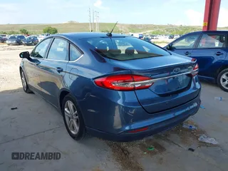 2018 Ford Fusion SE z VIN 3FA6P0HD8JR201052, wystawiony jako IAAI lot #42367050 z przebiegiem 90 502 mil mil oraz . Historia ofert i sprzedaży dostępna na DreamBid. Obrazek 3.