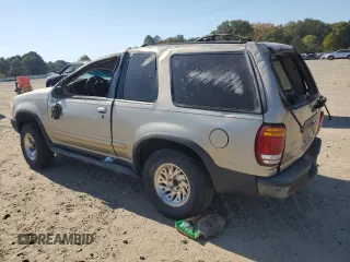 2000 Ford Explorer Sport with VIN 1FMYU60E3YUA95157, listed as a Copart auction lot 77214804 with 322,604 mi miles and Salvage title. Bid and sale history available at DreamBid. Image 2.