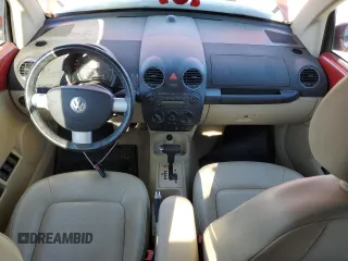 2010 Volkswagen Beetle with VIN 3VWRG3AL1AM005636, listed as a Copart auction lot 44068415 with 57,056 mi miles and Salvage Title. Bid and sale history available at DreamBid. Image 8.