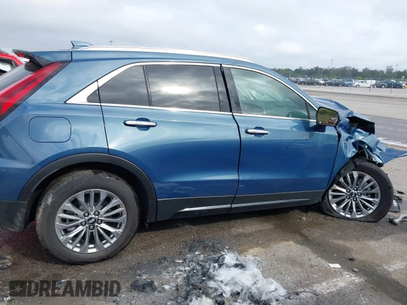 2024 Cadillac XT4 AWD Premium Luxury with VIN 1GYFZDR49RF209769, listed as a IAAI auction lot 40750875 with 1,221 mi miles and . Bid and sale history available at DreamBid. Image 12.