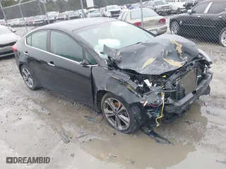 2016 Kia Forte EX with VIN KNAFZ4A86G5569957, listed as a IAAI auction lot 41571012 with 1 mi miles. Bid and sale history available at carsss.com. Image 1.