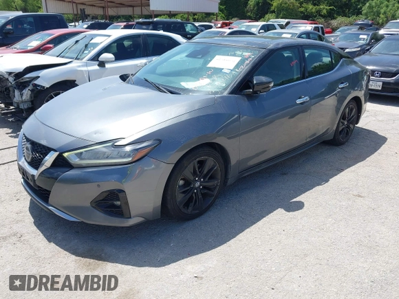 2020 Nissan Maxima SL with VIN 1N4AA6DVXLC373467, listed as a IAAI auction lot 42784055 with 221,014 mi miles and . Bid and sale history available at DreamBid. Image 2.