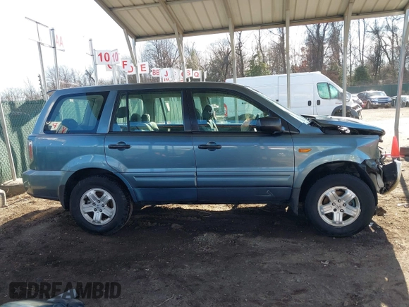 2006 Honda Pilot LX with VIN 2HKYF18156H542940, listed as a IAAI auction lot 41653949 with 152,321 mi miles and . Bid and sale history available at DreamBid. Image 14.