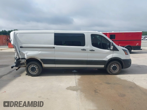 2023 Ford Transit Cargo с VIN 1FTBR1Y88PKA76644, выставлен на аукционе IAAI как лот 42382300 с пробегом 42 299 миль миль и . История ставок и продаж доступна на DreamBid. Изображение 13.