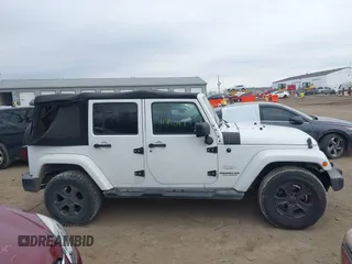 2014 Jeep Wrangler Unlimited Sahara with VIN 1C4BJWEGXEL326585, listed as a IAAI auction lot 41712047 with 155,973 mi miles. Bid and sale history available at carsss.com. Image 13.