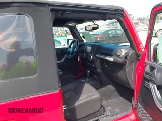 2014 Jeep Wrangler Sahara with VIN 1C4AJWBG0EL109773, listed as a IAAI auction lot 41678412 with 12,264 mi miles and . Bid and sale history available at DreamBid. Image 5.