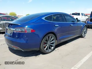 2016 Tesla Model S 70 kWh Battery with VIN 5YJSA1E10GF126433, listed as a IAAI auction lot 42169558 with 120,182 mi miles and . Bid and sale history available at carsss.com. Image 4.